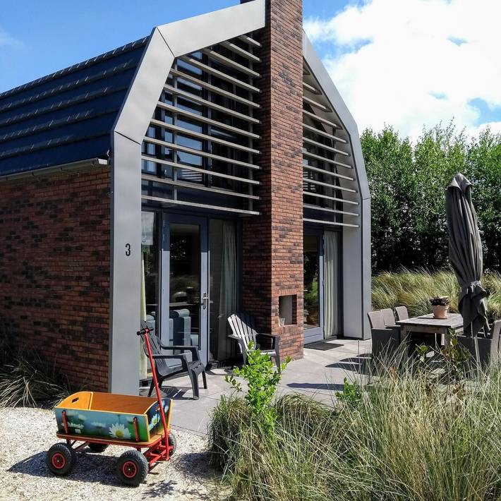 Ferienhaus für 6 Personen, mit Balkon/Terrasse und Terrasse sowie Garten und Sauna