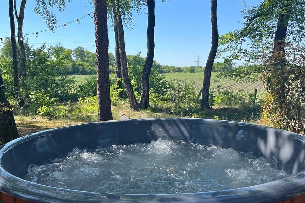 Wellness Lodge Hottub on the Salland Ridge in Hellendoorn in Sallandse Heuvelrug