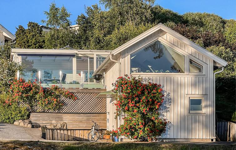 Ferienhaus für 4 Personen, mit Terrasse und Seeblick sowie Garten und Ausblick - 1