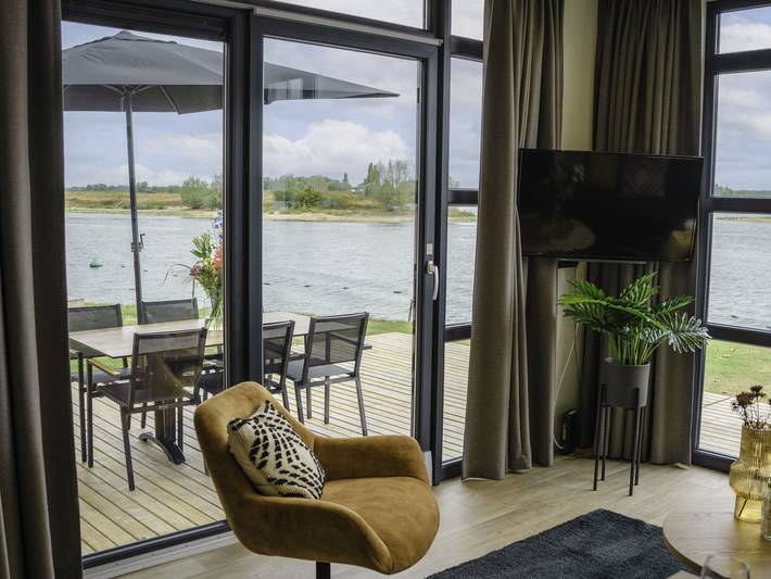 Huisje aan zee voor 6 personen, met uitzicht op het meer en terras, met huisdier in Buren Gemeente