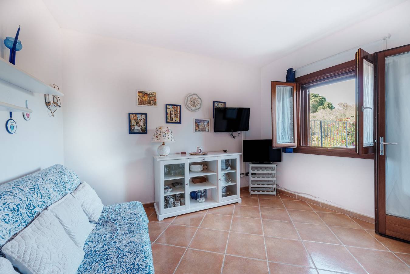 Appartamento intero, Appartamento 'Casa Vacanze Mango' con terrazza privata e aria condizionata in Li Cuncheddi, Gallura