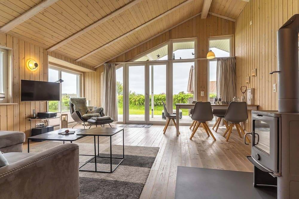 Ferienhaus mit Strandkorb, Kaminofen, Whirlpool und Sauna in Wesselburenerkoog, Dithmarschen