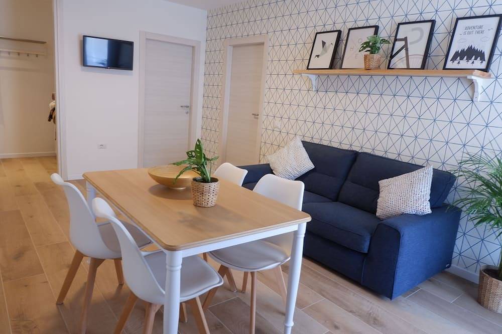Ganze Wohnung, 🌊 Radfahren, Surfen, Entspannen | Modernes Apartment in Seenähe in Torbole, Nago-Torbole