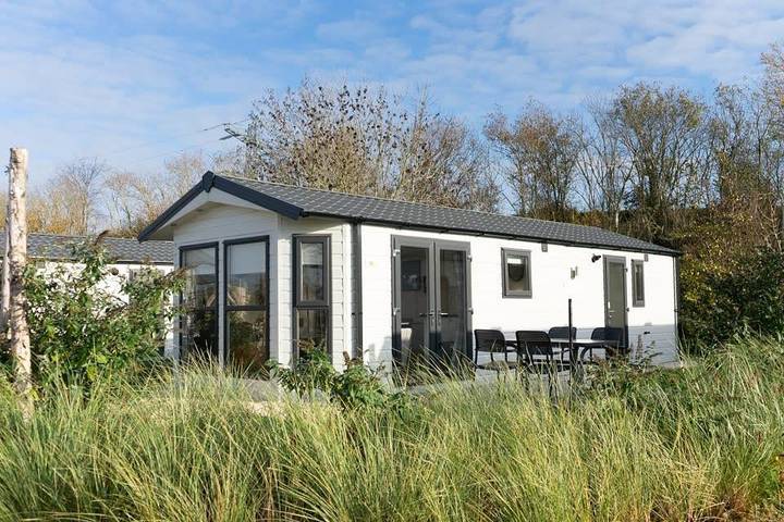 Ferienhaus für 4 Personen, mit Balkon/Terrasse und Terrasse sowie Garten