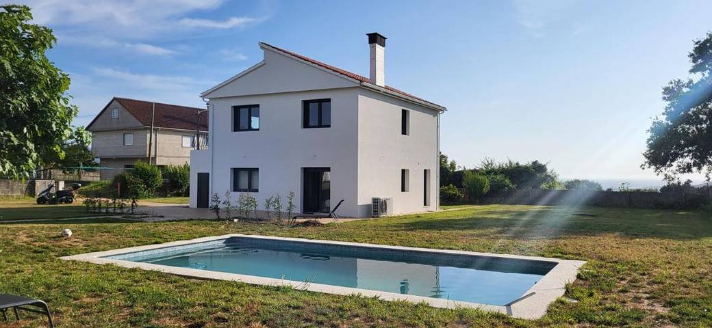 Casa de férias para 2 pessoas, com piscina e jardim em Nigrán