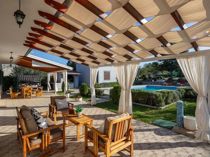 Ferienhaus für 7 Personen, mit Garten und Pool