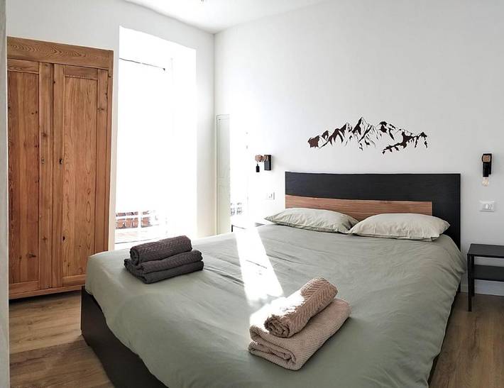 Ferienwohnung für 3 Personen, mit Balkon und Terrasse sowie Garten und Ausblick