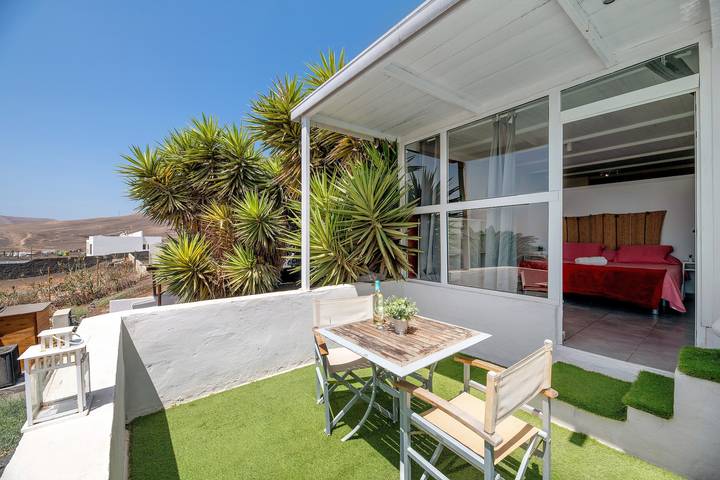 Casa vacanze 'Loft Amanecer' con vista mare, Wi-Fi e aria condizionata in Mácher, Tias
