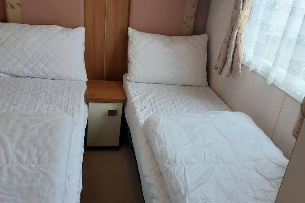 Cosy caravan with side decking at Felixstowe Beach Holiday Park in Felixstowe, Suffolk
