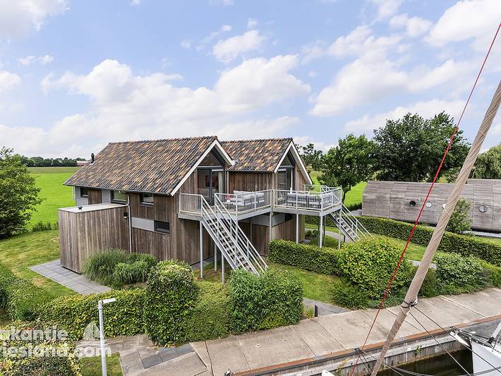 Ferienhaus für 4 Personen, mit Balkon/Terrasse und Terrasse sowie Garten und Sauna