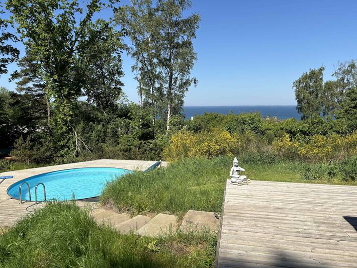 Ferieudlejning for 8 personer, med sauna og terrasse samt have i Fårevejle