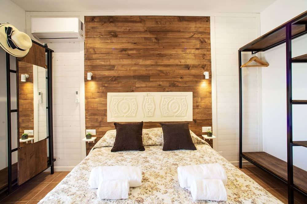 Gezellig appartement in vakantiehuis voor 4 personen met Wifi, airco, zwembad, Tv, patio en parking in Paderne, Faro District