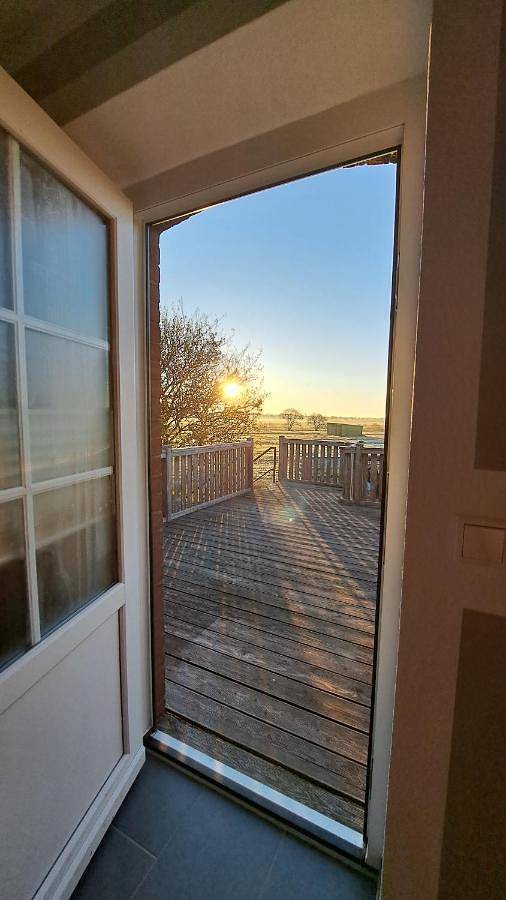 Ferienwohnung für 4 Personen, mit Terrasse und Garten sowie Ausblick in Südermarsch