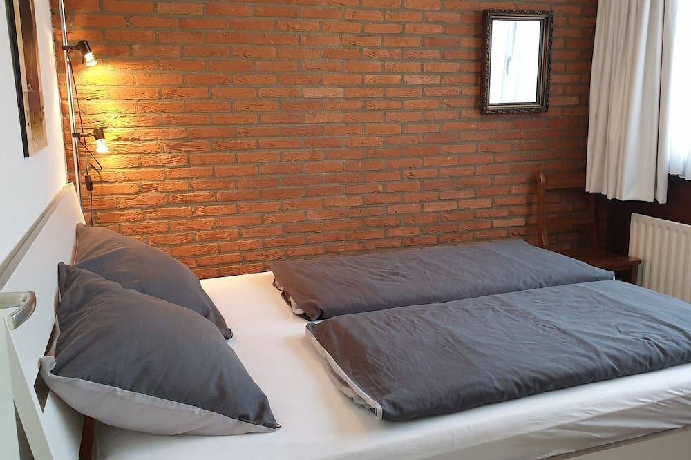 Gemütliches Ferienhaus mit Kamin, zu Fuß zum Strand in Nieuwvliet, Zeeuwse Kust