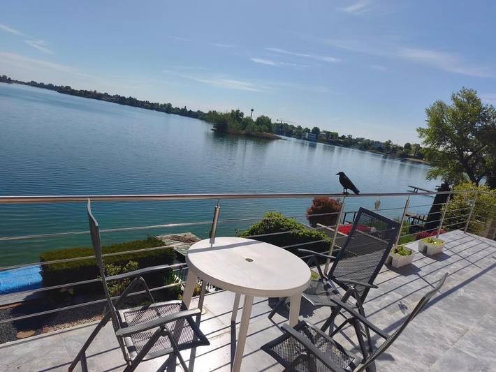 Appartement de vacances pour 4 personnes, avec jardin et balcon ainsi que vue sur le lac et vue