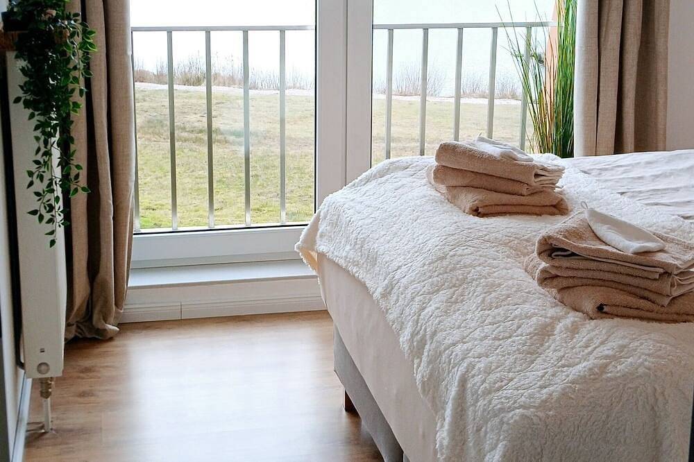 Ganze Wohnung, Renovierte Ferienwohnung Strandperle mit traumhaftem Blick auf's Timmeler Meer in Großefehn, Landkreis Aurich