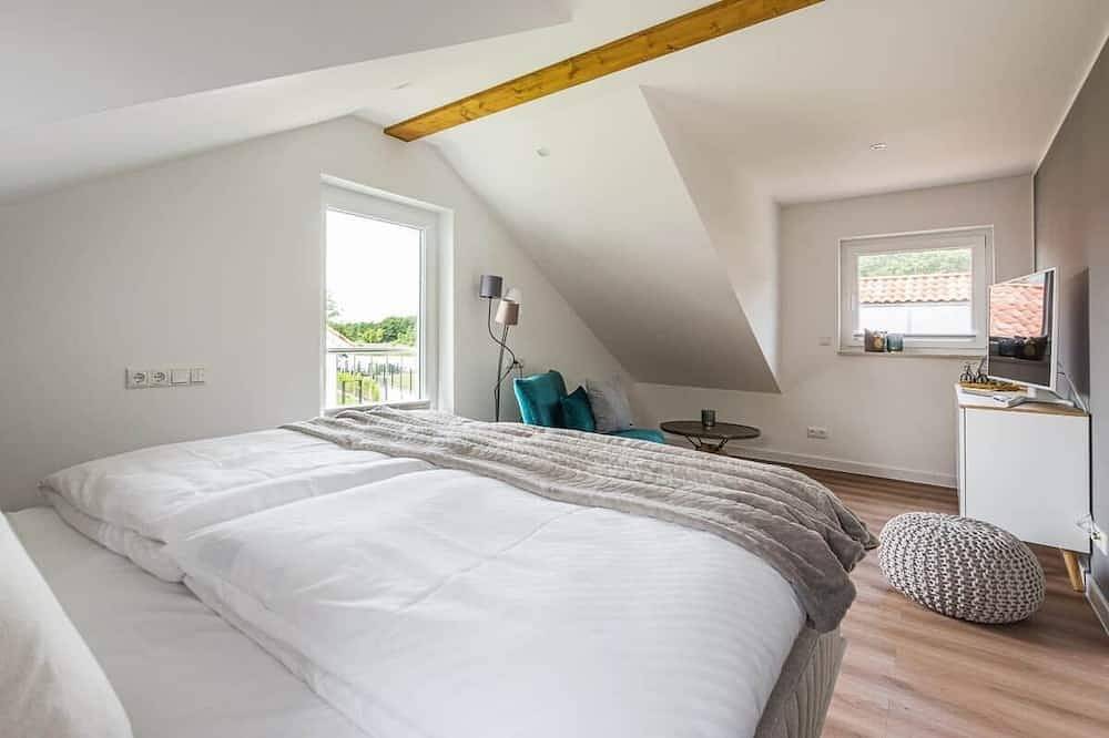 Ferienhaus Eisvogel am See mit Sauna und Kamin in Krakow am See, Mecklenburgische Seenplatte