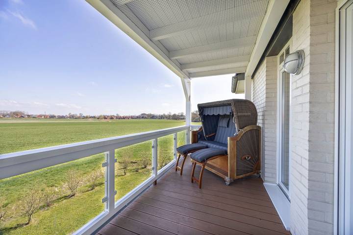 Ferienwohnung für 4 Personen, mit Balkon und Sauna sowie Ausblick in Wremen