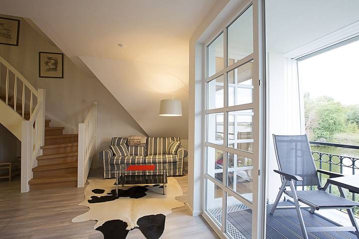 Ferienwohnung für 4 Personen, mit Balkon/Terrasse und Balkon sowie Seeblick und Sauna, mit Haustier am Balmer See