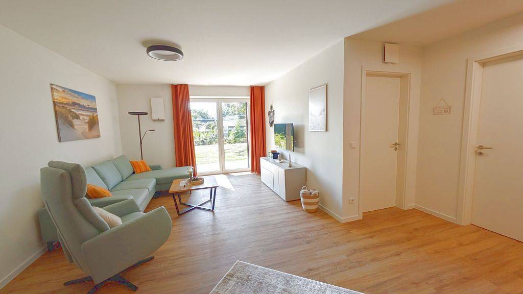 Ganze Wohnung, Schöne Tiet – Frische Auszeit. Modern. Terrasse mit Rasenfläche. Strandnah. in Tossens, Butjadingen