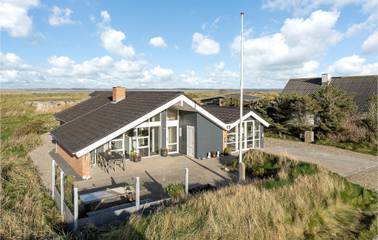 Ferienhaus für 8 Personen, mit Whirlpool und Sauna sowie Terrasse und Garten in Agger