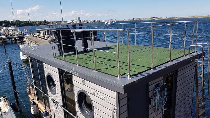 Boot für 2 Personen, mit Terrasse und Seeblick, mit Haustier in Heiligenhafen