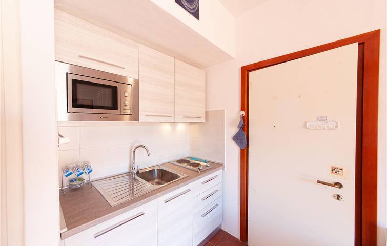 Ganze Ferienwohnung, Wohnung mit Meerblick in der Nähe von Li Cozi Beach in Costa Paradiso, Trinità d'Agultu e Vignola