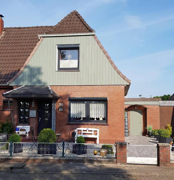 Ferienwohnung für 4 Personen, mit Terrasse und Garten sowie Ausblick in Nordenham
