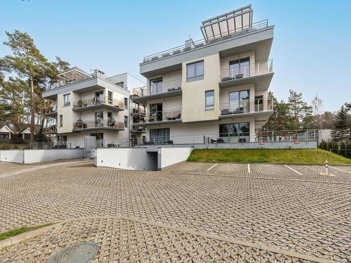 Ferienwohnung für 4 Personen, mit Balkon und Whirlpool sowie Terrasse und Garten in Pobierowo