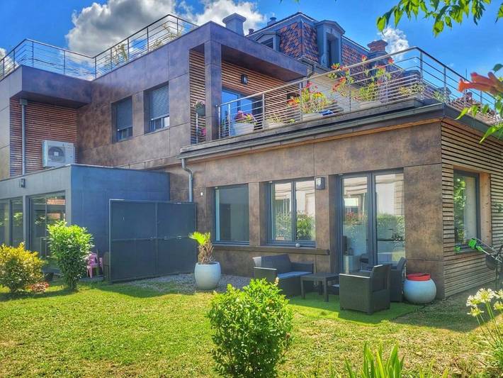 Ferienwohnung für 4 Personen, mit Terrasse und Garten sowie Seeblick und Ausblick