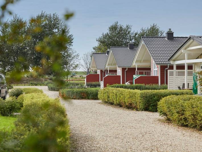 Ferienhaus für 3 Personen, mit Balkon/Terrasse und Terrasse sowie Garten und Sauna in Hedwigenkoog