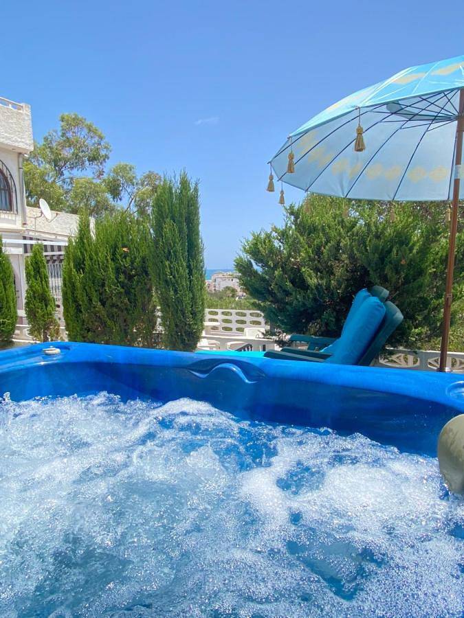 Villa by the sea with jacuzzi, garden & park view in Torrevieja, Costa Blanca