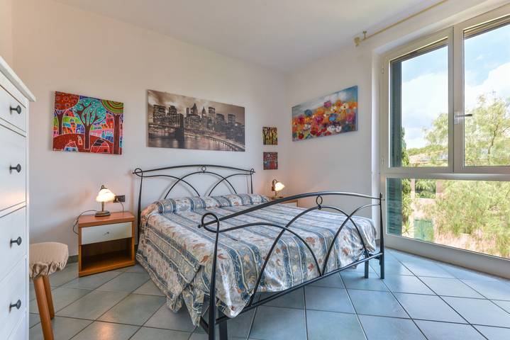 Appartamento intero, Appartamento per vacanze "Trilo Fucini" vicino alla spiaggia con terrazza privata in Marina di Campo, Campo nell'Elba
