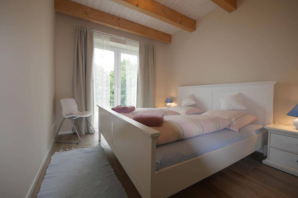 Neubau -- Landhausferien mit naturnahem Garten in Ostseenähe in Wangels, Hohwachter Bucht