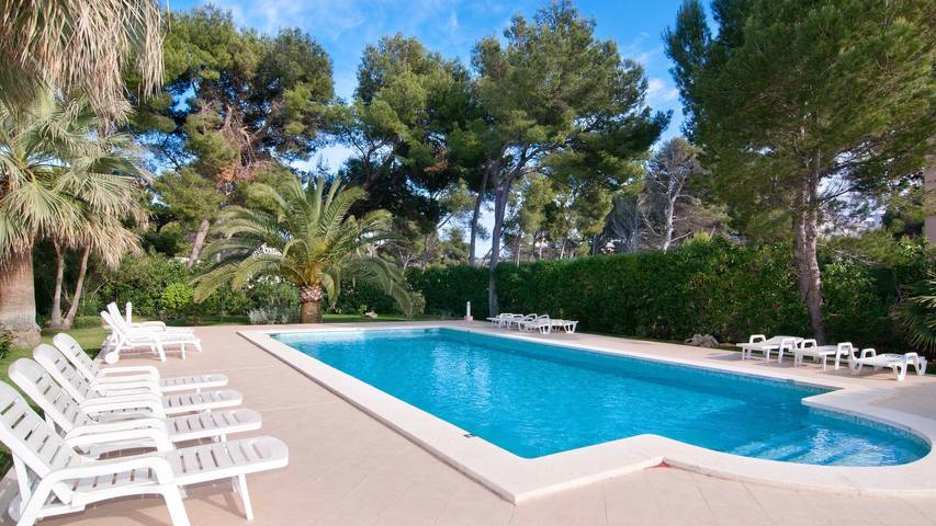 Ferienwohnung für 4 Personen, mit Balkon und Garten in Cala Agulla - 2
