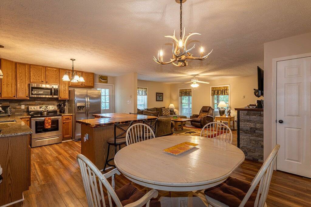 Adventure Awaits is located a 3,800 feet in elevation with hot tub and pretty views! Pet friendly! in Blue Ridge Parkway, Seven Devils