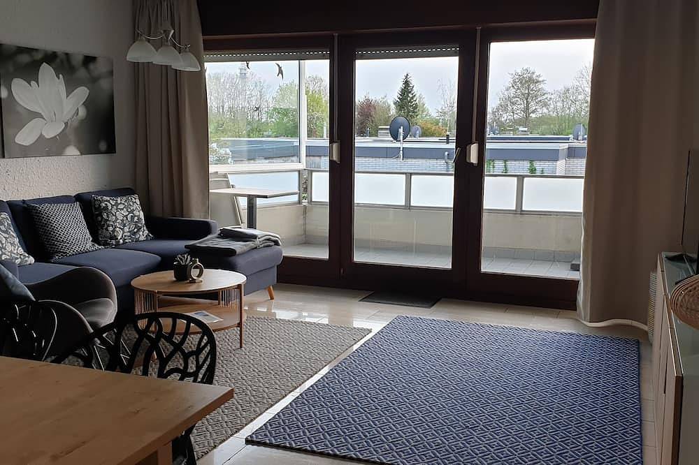 Entire apartment, Lovingly renovated apartment with large balcony right on the dyke in Tossens, Butjadingen
