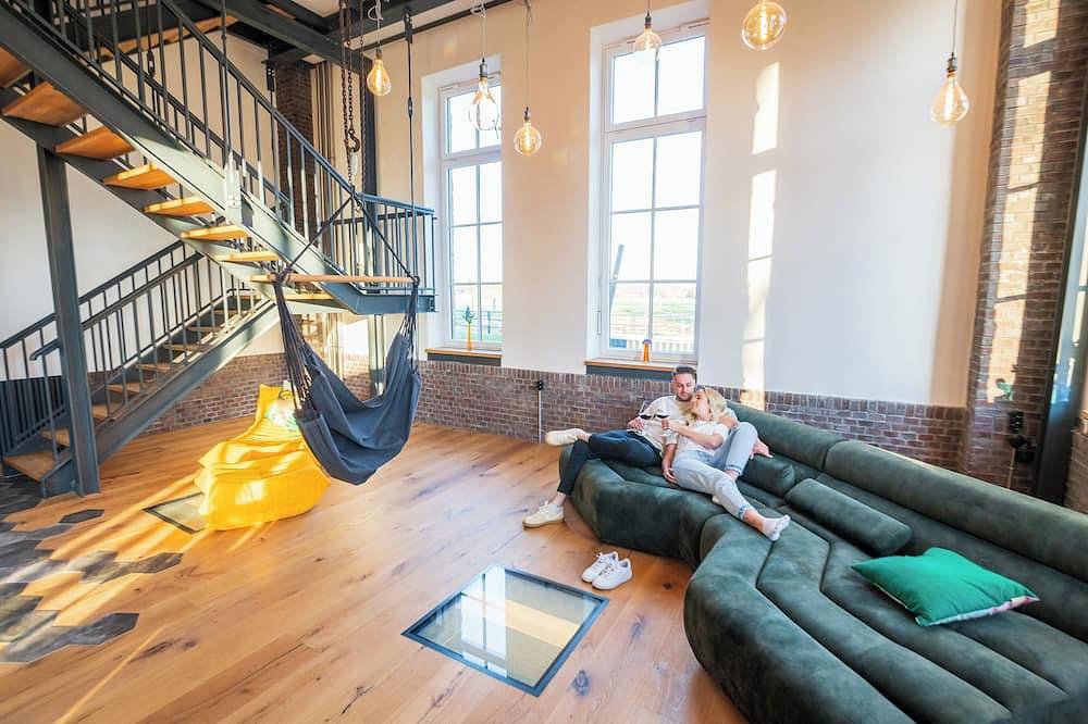 Geheel appartement, Loft - Pumpensaal vacation apartment Pumpensaal Loft in the old Tecklenburg waterworks in Tecklenburg, Münsterland