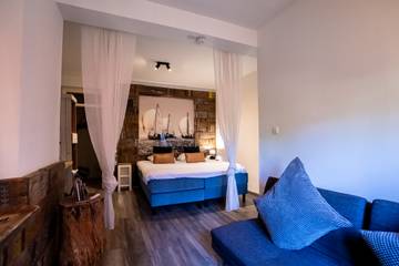 Location de vacances pour 3 personnes, avec terrasse et balcon/terrasse à Lanaken