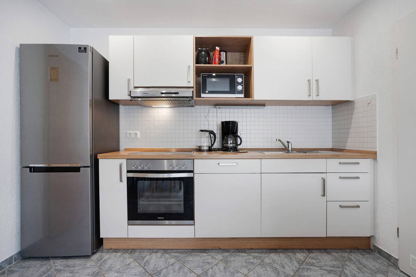 Appartement entier, Appartement 'Ferienwohnung Zur Kirche' avec jardin partagé et Wi-Fi in Lac de Senftenberg, Senftenberg