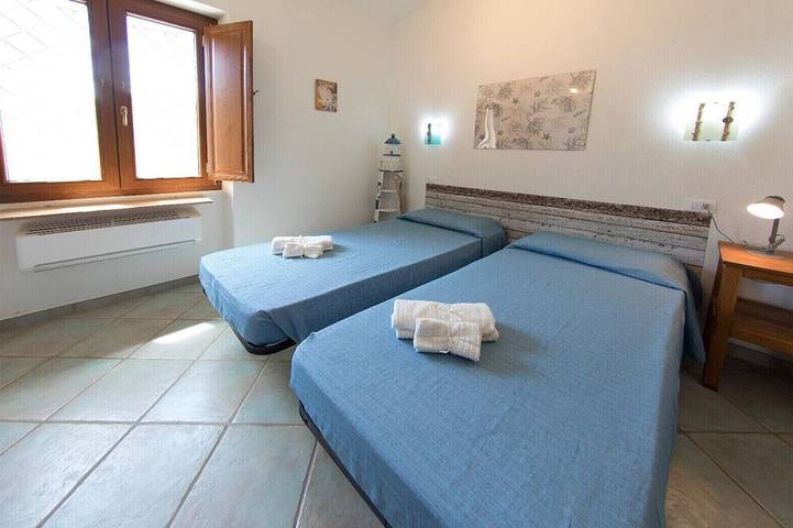 Villa Paradiso, in the beach by foot, big garden,  Wifi, all inclusive in Cala Liberotto, Orosei
