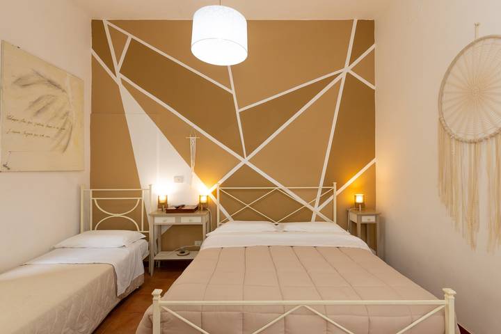 Room 'Piccolo Paradiso - Camera 5' with Shared Terrace, Shared Garden and Wi-Fi in Livorno, Etruscan Coast