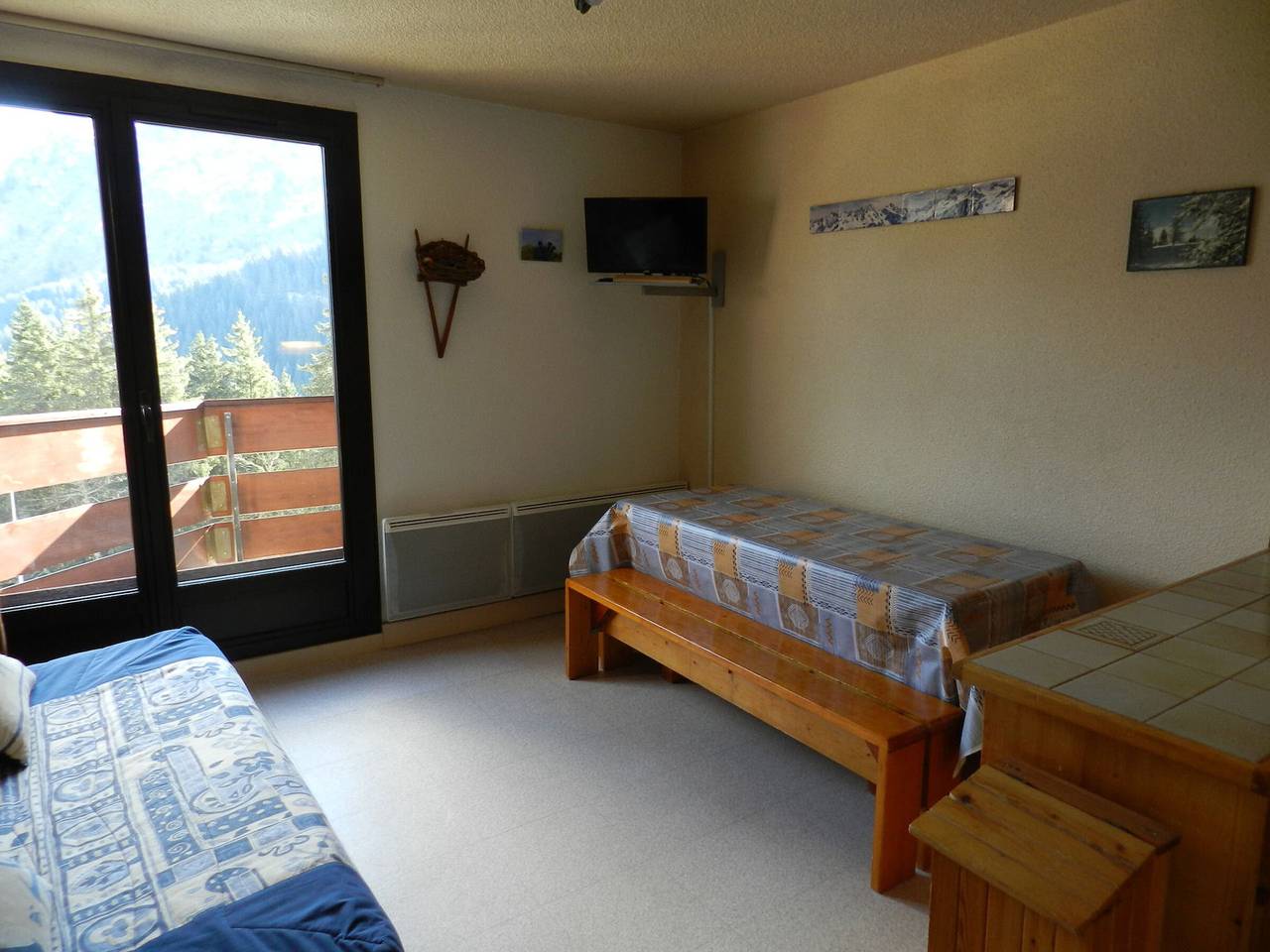 Appartement entier, Appartement cosy au pied des pistes avec balcon, ascenseur, casier à skis et parking gratuit in La Ferrière, Le Pleynet Les Sept Laux