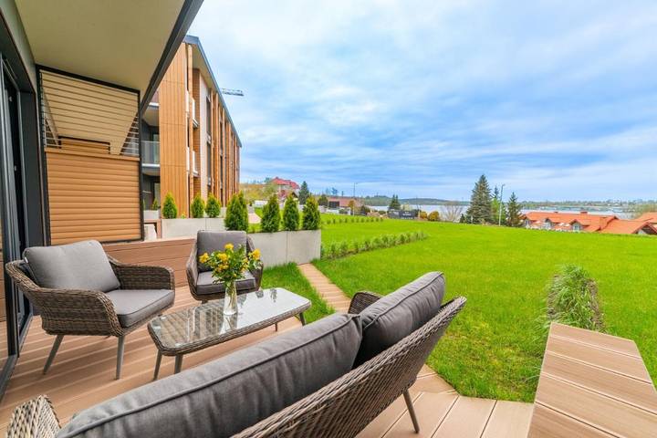 Apartament wakacyjny dla 4 osób, z Taras i Ogród oraz Sauna i Widok na jezioro w Mikołajki