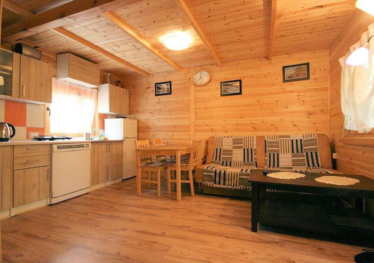 Sztil - Apartamenty i drewniane domki in Pobierowo, Powiat gryficki