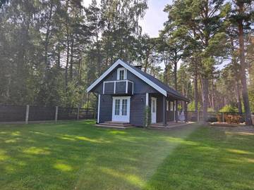 Location de vacances pour 4 personnes, avec vue ainsi que jardin et sauna dans Kolka
