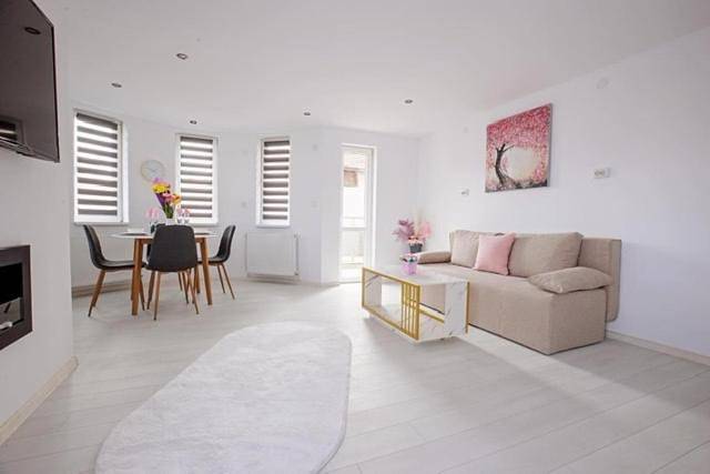Appartement de vacances pour 4 personnes, avec jacuzzi ainsi que jardin et sauna