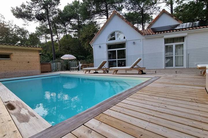 Chalet voor 7 personen, with tuin and sauna as well as whirlpool in Biscarrosse