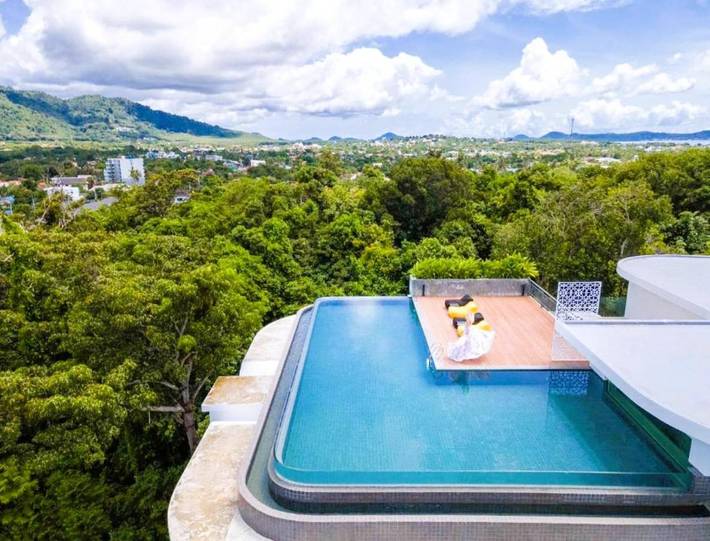 Appartement de vacances pour 2 personnes, avec jardin et bassin pour enfant ainsi que piscine et vue