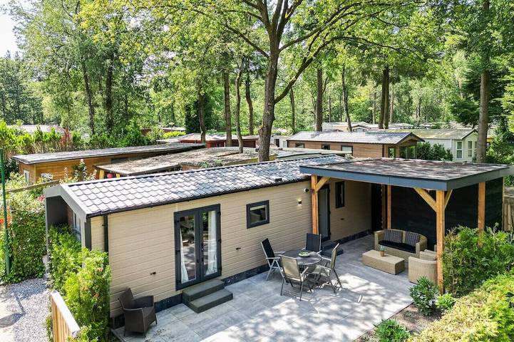 Blokhut voor 4 personen, met sauna en tuin in Hoenderloo